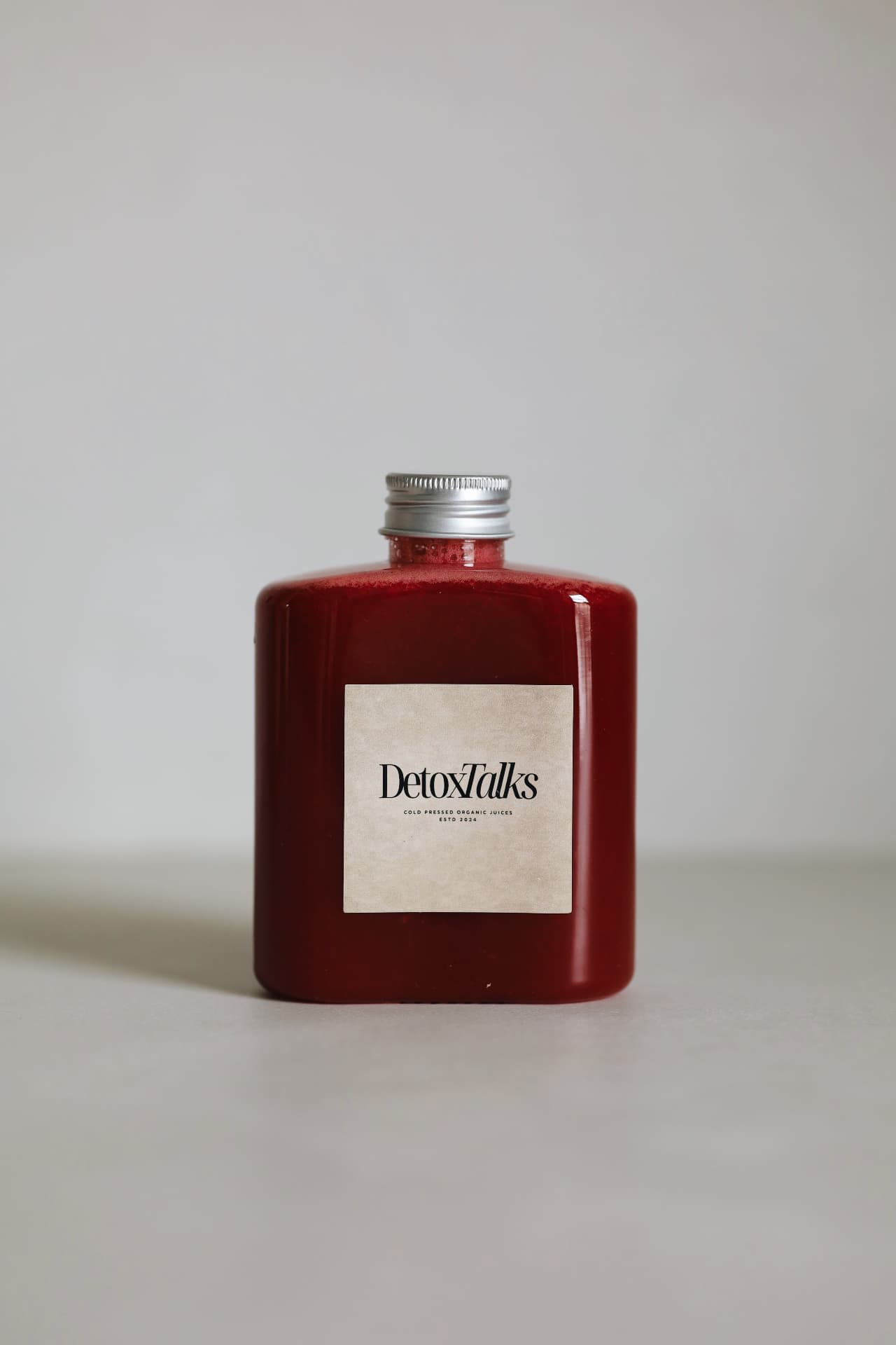 The Reviver bottle with the Detox Talks Club label