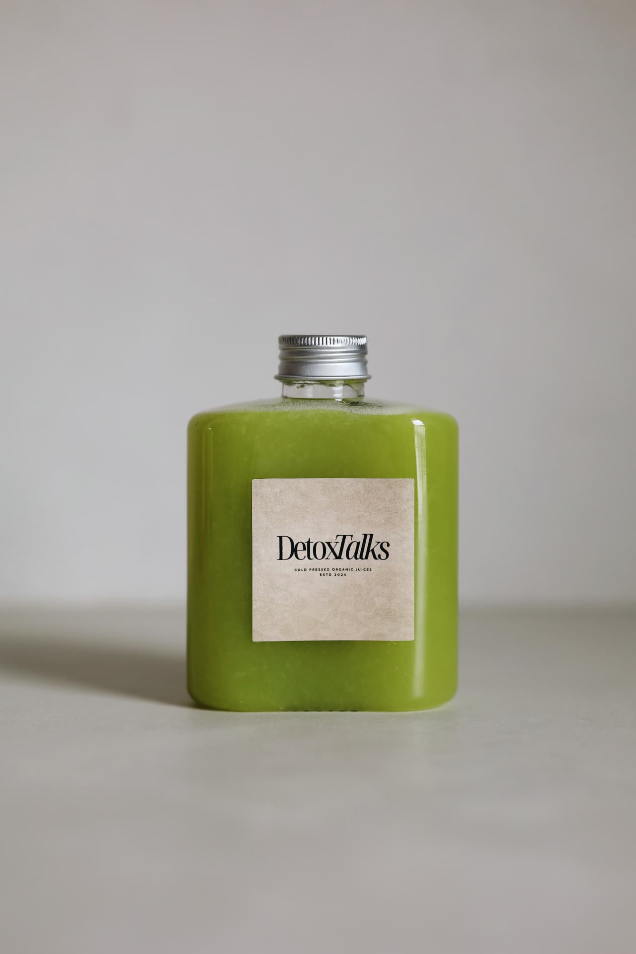The Earth Charge bottle with the Detox Talks Club label